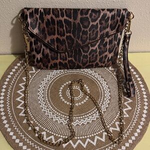 Tania Leopard Clutch by Christina’s Boutiques with gold chain strap to match